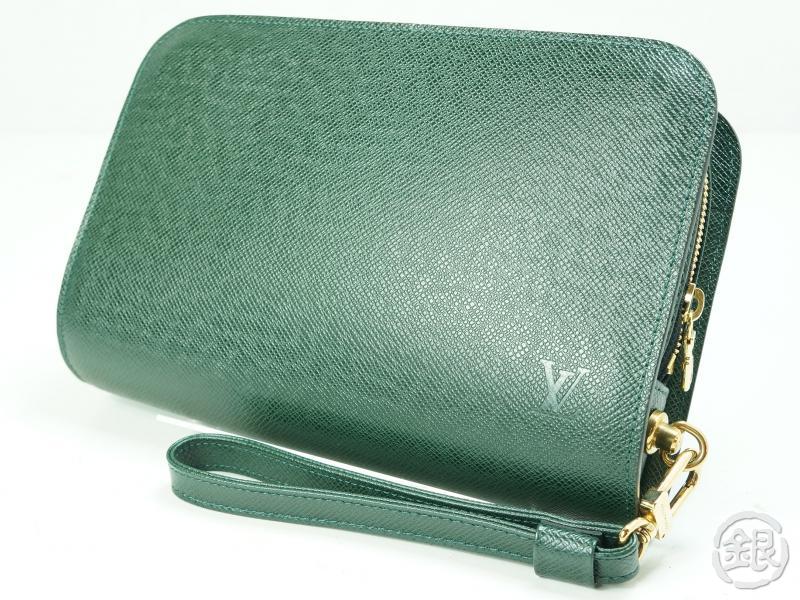 lv taiga clutch bag